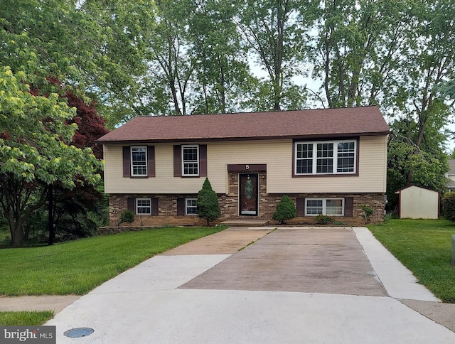 5 Wood Oak, Nottingham, MD 21236 - split foyer home with a front yard, brick siding, and concrete driveway
