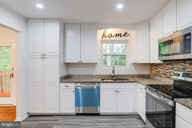5 Wood Oak, Nottingham, MD 21236 - kitchen with stainless steel appliances, light wood-style floors, stone countertops, recessed lighting, and healthy amount of natural light