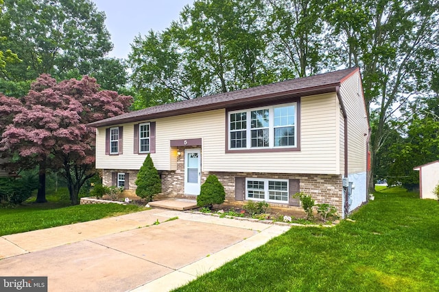 5 Wood Oak, Nottingham, MD 21236 - split foyer home featuring a front yard and brick siding