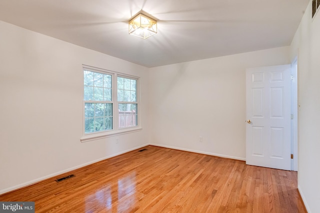 5 Wood Oak, Nottingham, MD 21236 - spare room with light wood-style floors and baseboards