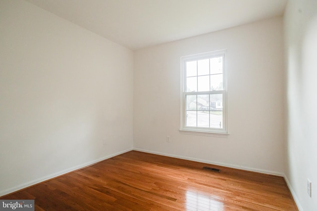 5 Wood Oak, Nottingham, MD 21236 - unfurnished room with wood finished floors and baseboards