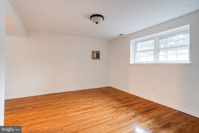 5 Wood Oak, Nottingham, MD 21236 - empty room with light wood-style floors and electric panel