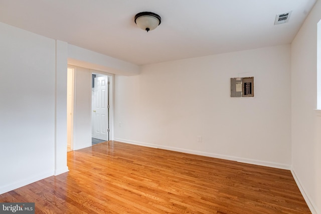 5 Wood Oak, Nottingham, MD 21236 - spare room with electric panel and wood finished floors