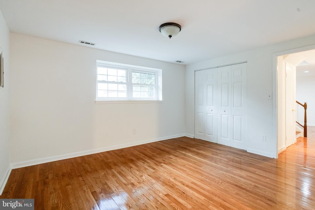 5 Wood Oak, Nottingham, MD 21236 - unfurnished bedroom with light wood-style flooring and a closet