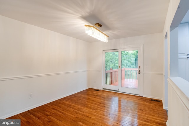 5 Wood Oak, Nottingham, MD 21236 - empty room featuring wood finished floors and baseboards