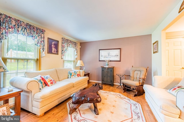living area with light wood-style floors