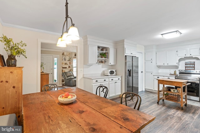 11600 Saddleback Dr, Fredericksburg, VA 22407 - dining room featuring dark wood-style floors and ornamental molding