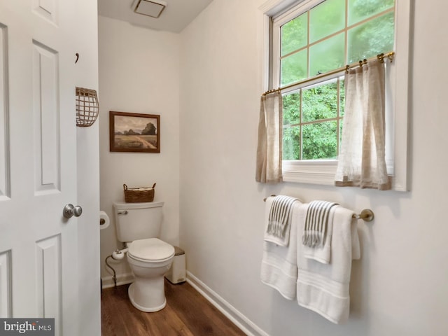 11600 Saddleback Dr, Fredericksburg, VA 22407 - bathroom featuring plenty of natural light, wood finished floors, toilet, and baseboards
