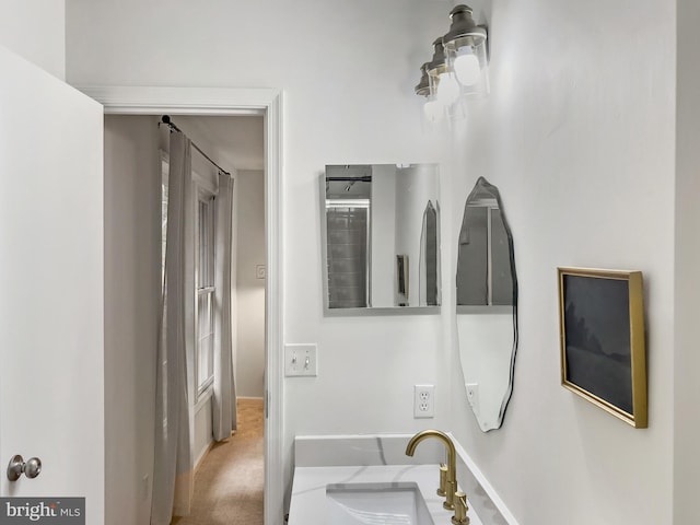 11600 Saddleback Dr, Fredericksburg, VA 22407 - bathroom with baseboards and a sink