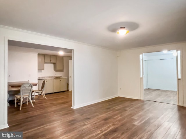 11600 Saddleback Dr, Fredericksburg, VA 22407 - living area featuring crown molding, dark wood finished floors, and baseboards