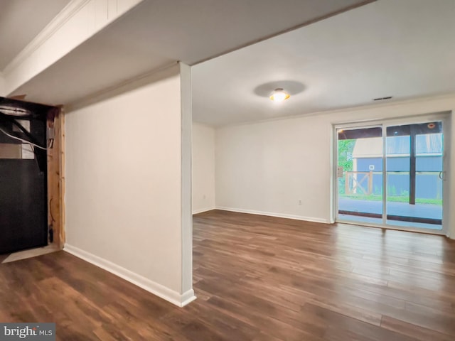 11600 Saddleback Dr, Fredericksburg, VA 22407 - unfurnished room with baseboards, dark wood-type flooring, and ornamental molding