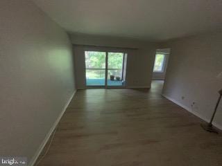 129 Echelon Rd, Voorhees, NJ 08043 - unfurnished living room with baseboards and wood finished floors