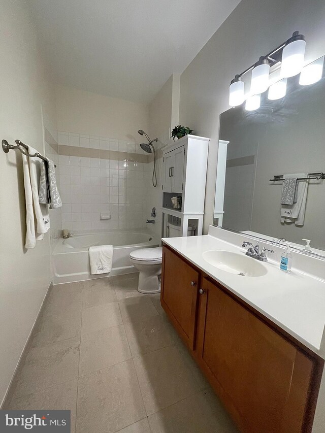 4862 Eisenhower Ave Unit 269, Alexandria, VA 22304 - full bath featuring tile patterned floors, toilet, vanity, and washtub / shower combination