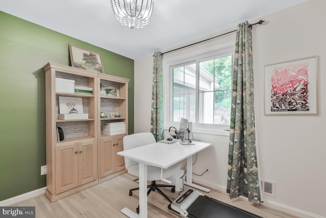 2901 N Rochester St, Arlington, VA 22213 - office area with light wood finished floors, a chandelier, and baseboards