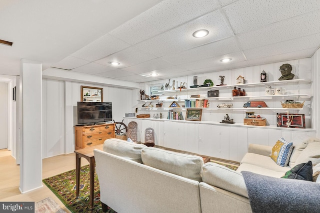 2901 N Rochester St, Arlington, VA 22213 - living area with a drop ceiling and light wood-style flooring