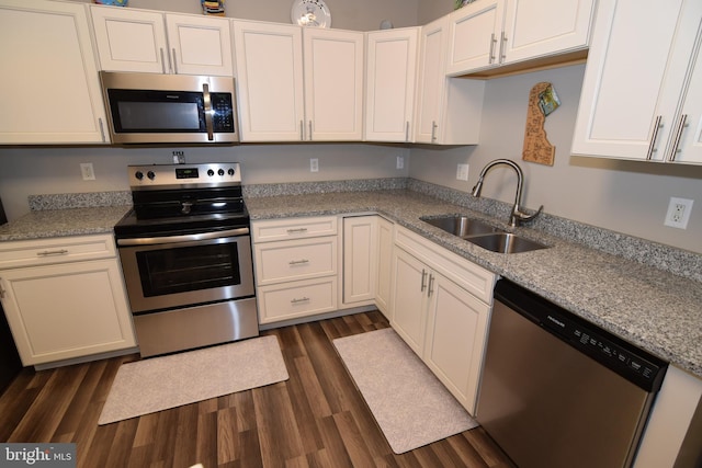 359 Eagle Way, Smyrna, DE 19977 - kitchen with appliances with stainless steel finishes, a sink, dark wood finished floors, and white cabinetry