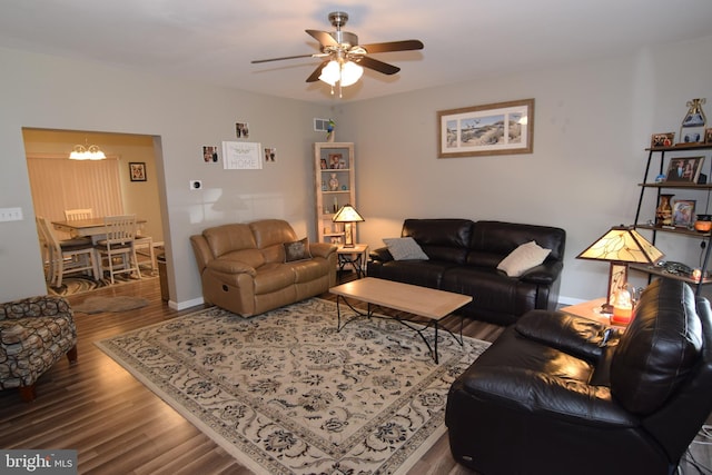 359 Eagle Way, Smyrna, DE 19977 - living area featuring wood finished floors, ceiling fan, baseboards, and a chandelier