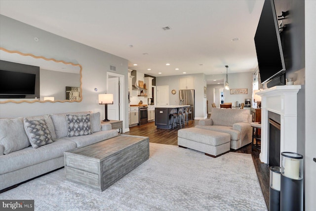 3118 Grove Ct, Mechanicsburg, PA 17055 - living room with dark wood-style floors and recessed lighting