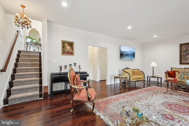 living room featuring wood finished floors, stairs, recessed lighting, and baseboards
