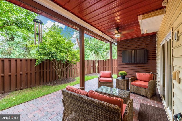 view of patio / terrace with a fenced backyard and outdoor lounge area