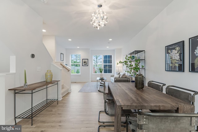 11244 Faraday Park Dr, Reston, VA 20190 - dining area featuring stairway, wood finished floors, recessed lighting, and a chandelier