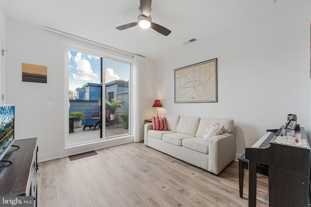 11244 Faraday Park Dr, Reston, VA 20190 - living room with a ceiling fan and light wood-type flooring