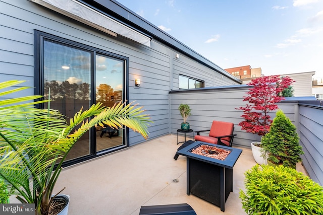 11244 Faraday Park Dr, Reston, VA 20190 - view of patio / terrace with an outdoor fire pit and fence