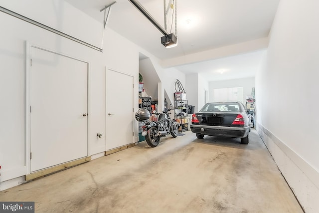 11244 Faraday Park Dr, Reston, VA 20190 - garage featuring a garage door opener