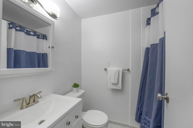 1601 18th St NW Unit 1015, Washington, DC 20009 - bathroom featuring vanity, toilet, and a shower with curtain