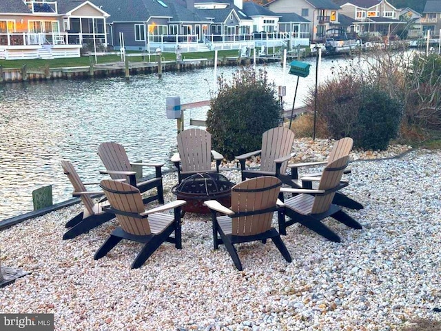 18 Ebb Tide Ct, Ocean Pines, MD 21811 - view of patio / terrace with an outdoor fire pit, a residential view, and a water view