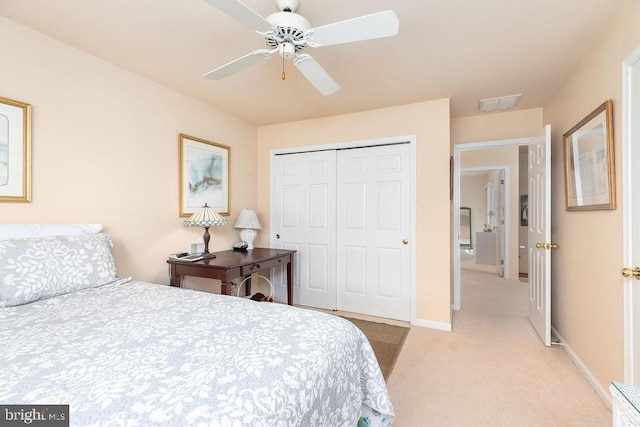 18 Ebb Tide Ct, Ocean Pines, MD 21811 - bedroom featuring light carpet, a closet, baseboards, and ceiling fan