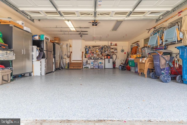 18 Ebb Tide Ct, Ocean Pines, MD 21811 - garage with a garage door opener and a workshop area