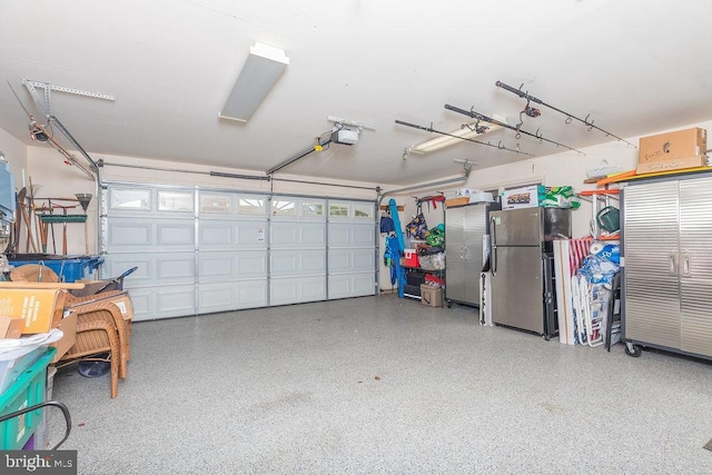 18 Ebb Tide Ct, Ocean Pines, MD 21811 - garage with freestanding refrigerator and a garage door opener