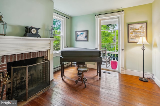 501 Park Row Pl, Harpers Ferry, WV 25425 - sitting room featuring hardwood / wood-style floors and a brick fireplace