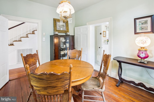 501 Park Row Pl, Harpers Ferry, WV 25425 - dining space with hardwood / wood-style floors and stairway