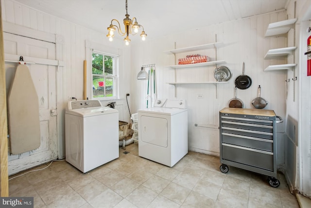 501 Park Row Pl, Harpers Ferry, WV 25425 - laundry room featuring washing machine and clothes dryer, a chandelier, and light tile patterned flooring