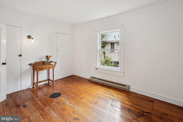 501 Park Row Pl, Harpers Ferry, WV 25425 - spare room with a baseboard radiator and hardwood / wood-style floors