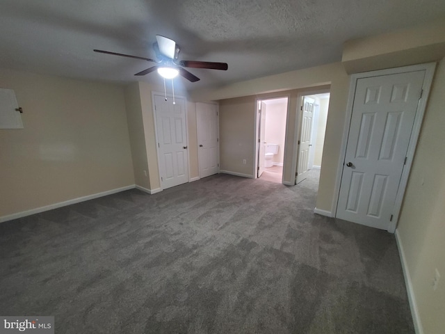 117 S Shenandoah Ave, Front Royal, VA 22630 - unfurnished bedroom with carpet floors, baseboards, connected bathroom, and ceiling fan