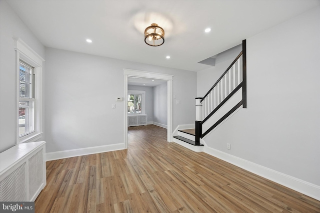 329 Euclid Ave, Trenton, NJ 08609 - entrance foyer featuring radiator heating unit, stairs, light wood-type flooring, recessed lighting, and baseboards