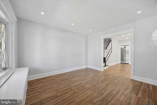 329 Euclid Ave, Trenton, NJ 08609 - spare room with stairway, wood finished floors, baseboards, and recessed lighting