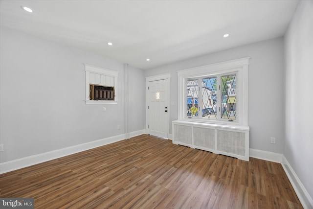 329 Euclid Ave, Trenton, NJ 08609 - foyer entrance featuring wood finished floors, baseboards, recessed lighting, radiator heating unit, and cooling unit