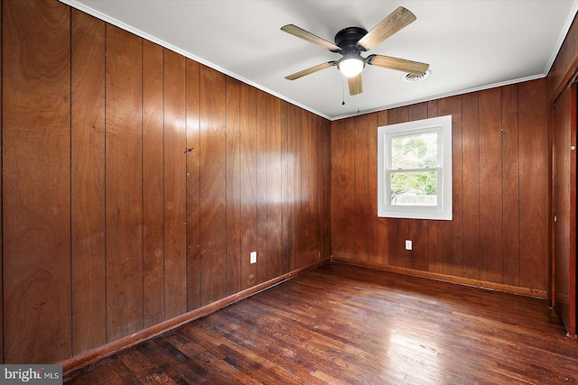 104 Louise Ave, Salisbury, MD 21804 - unfurnished room with wood finished floors, a ceiling fan, baseboards, and wood walls