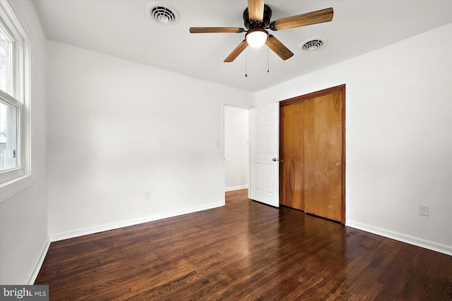 104 Louise Ave, Salisbury, MD 21804 - unfurnished bedroom with wood finished floors, a closet, baseboards, and ceiling fan