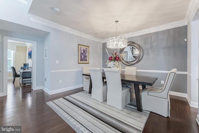 23412 Longollen Woods Ter, Ashburn, VA 20148 - dining room featuring a chandelier, wood finished floors, baseboards, and crown molding