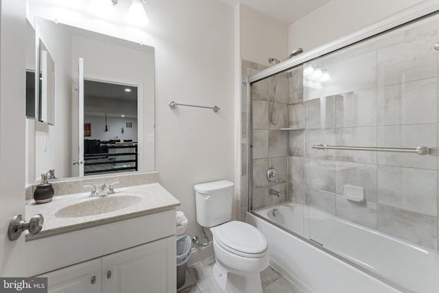 23412 Longollen Woods Ter, Ashburn, VA 20148 - full bathroom featuring toilet, vanity, and enclosed tub / shower combo