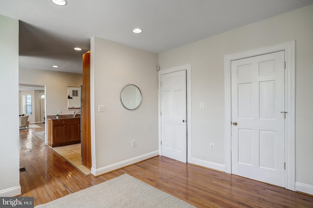15 Todd Pl NE, Washington, DC 20002 - unfurnished bedroom featuring light wood-type flooring, baseboards, and recessed lighting
