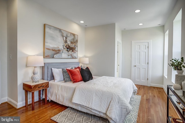 15 Todd Pl NE, Washington, DC 20002 - bedroom with light wood-type flooring, baseboards, and recessed lighting