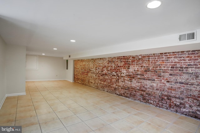 15 Todd Pl NE, Washington, DC 20002 - finished basement featuring brick wall, baseboards, recessed lighting, and light tile patterned floors