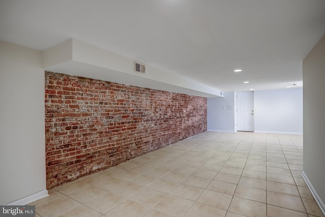 15 Todd Pl NE, Washington, DC 20002 - finished basement with brick wall, baseboards, and recessed lighting