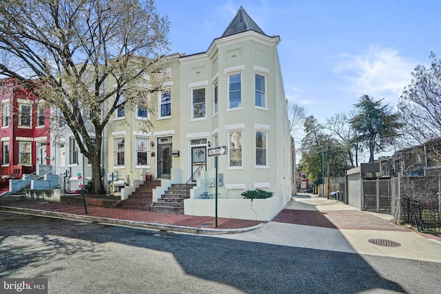 15 Todd Pl NE, Washington, DC 20002 - view of front of property with fence and stucco siding
